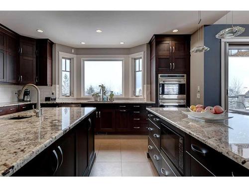 204 Leighton Court, Rural Rocky View County, AB - Indoor Photo Showing Kitchen With Upgraded Kitchen