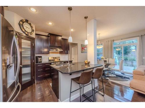 124 Westcreek Green, Chestermere, AB - Indoor Photo Showing Kitchen With Double Sink With Upgraded Kitchen