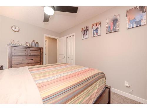 124 Westcreek Green, Chestermere, AB - Indoor Photo Showing Bedroom