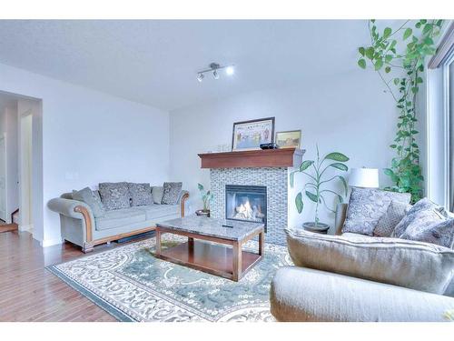 21 Saddlelake Gardens Ne, Calgary, AB - Indoor Photo Showing Living Room With Fireplace