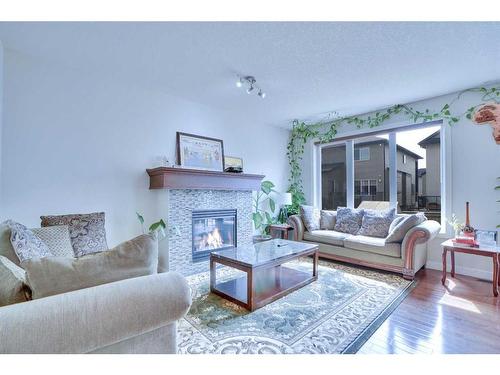 21 Saddlelake Gardens Ne, Calgary, AB - Indoor Photo Showing Living Room With Fireplace