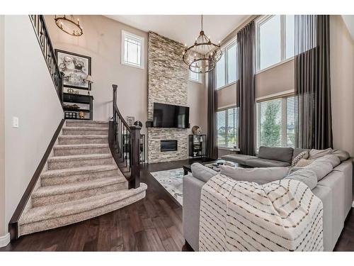 284 Aspenmere Circle, Chestermere, AB - Indoor With Fireplace