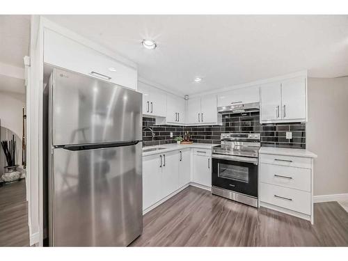 284 Aspenmere Circle, Chestermere, AB - Indoor Photo Showing Kitchen With Upgraded Kitchen