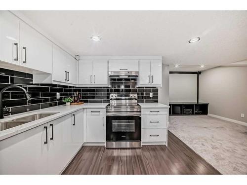 284 Aspenmere Circle, Chestermere, AB - Indoor Photo Showing Kitchen With Double Sink With Upgraded Kitchen