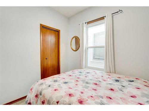 6 New Place Se, Calgary, AB - Indoor Photo Showing Bedroom