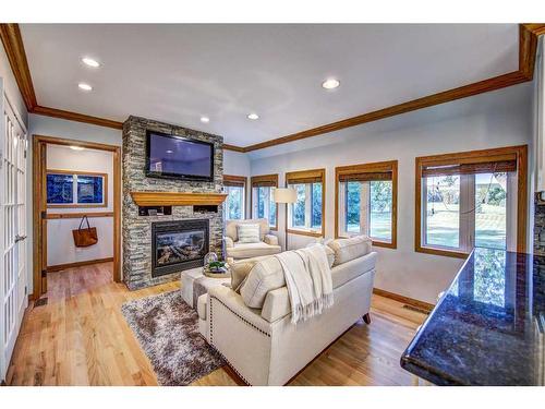 33 Cullen Creek Estates, Rural Rocky View County, AB - Indoor Photo Showing Living Room With Fireplace