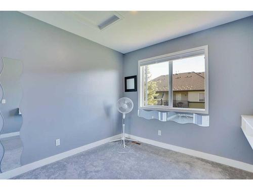 306-140 Sagewood Boulevard Sw, Airdrie, AB - Indoor Photo Showing Other Room