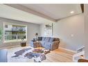 306-140 Sagewood Boulevard Sw, Airdrie, AB  - Indoor Photo Showing Living Room 