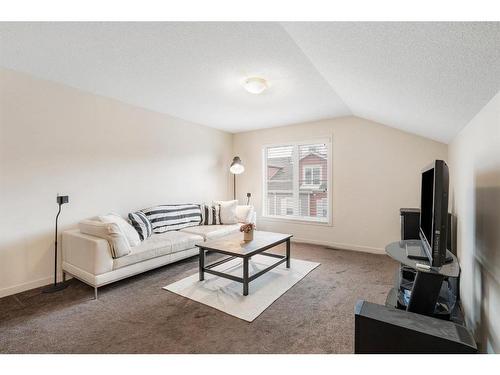 1220-10 Auburn Bay Avenue Se, Calgary, AB - Indoor Photo Showing Living Room