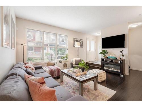 1220-10 Auburn Bay Avenue Se, Calgary, AB - Indoor Photo Showing Living Room