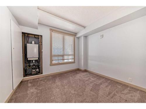 1508-8710 Horton Road Sw, Calgary, AB - Indoor Photo Showing Other Room