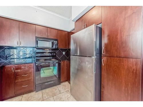 1508-8710 Horton Road Sw, Calgary, AB - Indoor Photo Showing Kitchen