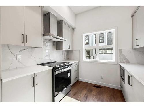 211-595 Mahogany Road Se, Calgary, AB - Indoor Photo Showing Kitchen With Upgraded Kitchen