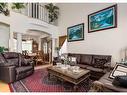 1625 Evergreen Drive Sw, Calgary, AB  - Indoor Photo Showing Living Room 