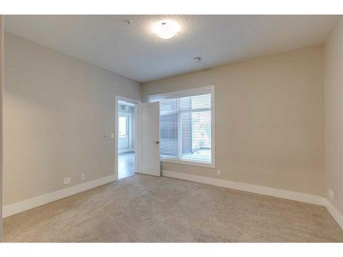 210-1702 17 Avenue Sw, Calgary, AB - Indoor Photo Showing Other Room