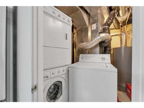 80 Saddlecreek Terrace Ne, Calgary, AB - Indoor Photo Showing Laundry Room