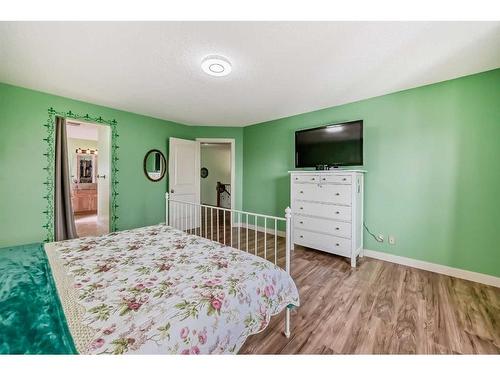 204 Silverado Boulevard Sw, Calgary, AB - Indoor Photo Showing Bedroom