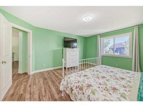 204 Silverado Boulevard Sw, Calgary, AB - Indoor Photo Showing Bedroom