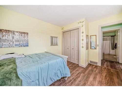 204 Silverado Boulevard Sw, Calgary, AB - Indoor Photo Showing Bedroom