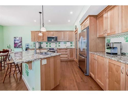 204 Silverado Boulevard Sw, Calgary, AB - Indoor Photo Showing Kitchen With Double Sink