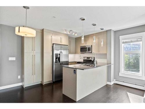 1211-11 Mahogany Row Se, Calgary, AB - Indoor Photo Showing Kitchen With Stainless Steel Kitchen