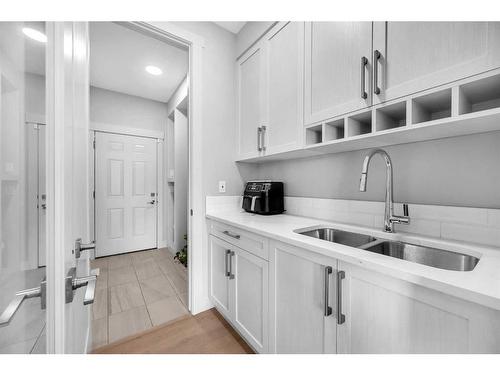 111 Legacy Landing Se, Calgary, AB - Indoor Photo Showing Kitchen With Double Sink