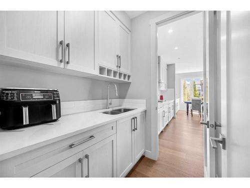 111 Legacy Landing Se, Calgary, AB - Indoor Photo Showing Kitchen With Double Sink