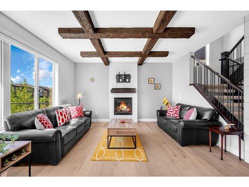 111 Legacy Landing Se, Calgary, AB - Indoor Photo Showing Living Room With Fireplace