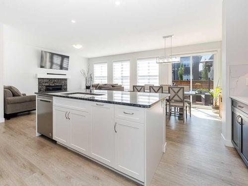 713 Midtown Drive Sw, Airdrie, AB - Indoor Photo Showing Kitchen