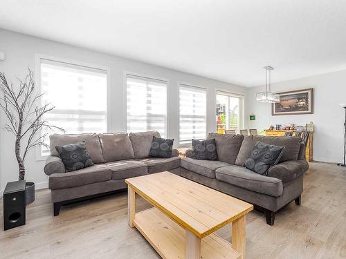 713 Midtown Drive Sw, Airdrie, AB - Indoor Photo Showing Living Room