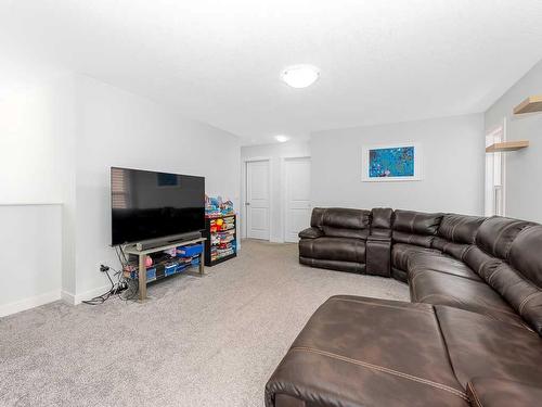 713 Midtown Drive Sw, Airdrie, AB - Indoor Photo Showing Living Room