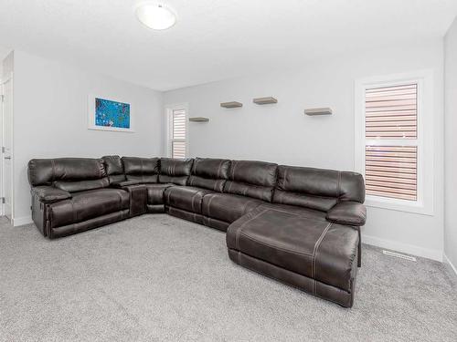 713 Midtown Drive Sw, Airdrie, AB - Indoor Photo Showing Living Room