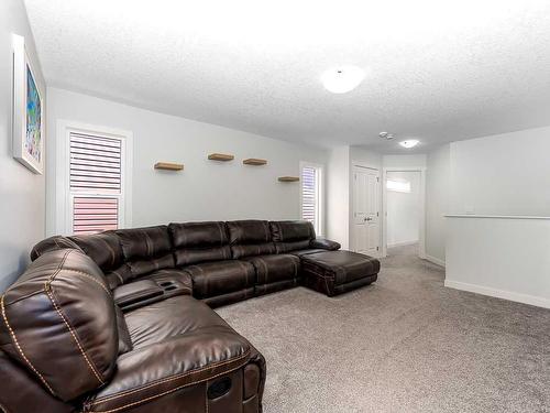 713 Midtown Drive Sw, Airdrie, AB - Indoor Photo Showing Living Room