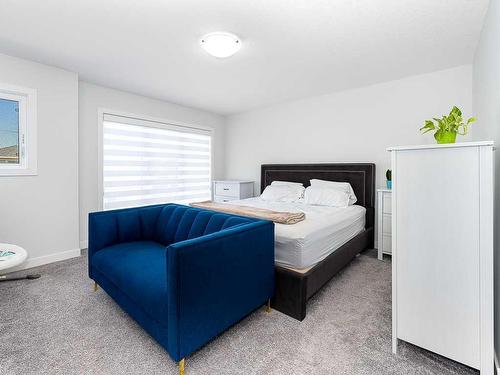 713 Midtown Drive Sw, Airdrie, AB - Indoor Photo Showing Bedroom