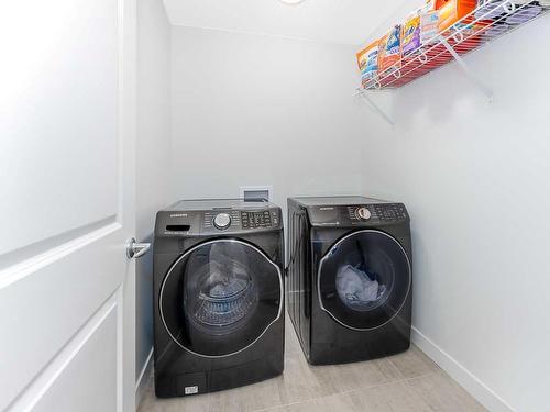 713 Midtown Drive Sw, Airdrie, AB - Indoor Photo Showing Laundry Room