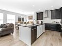 713 Midtown Drive Sw, Airdrie, AB  - Indoor Photo Showing Kitchen With Upgraded Kitchen 