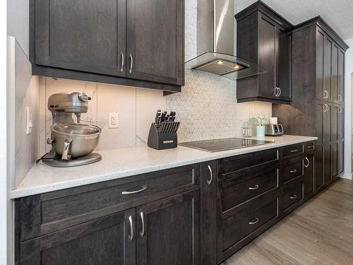 713 Midtown Drive Sw, Airdrie, AB - Indoor Photo Showing Kitchen