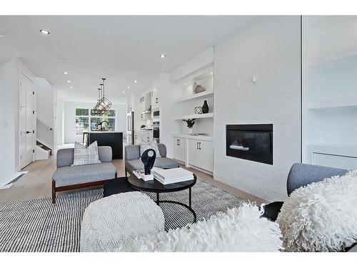 824 21 Avenue Nw, Calgary, AB - Indoor Photo Showing Living Room With Fireplace