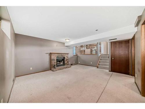 308 Macewan Valley Road Nw, Calgary, AB - Indoor With Fireplace