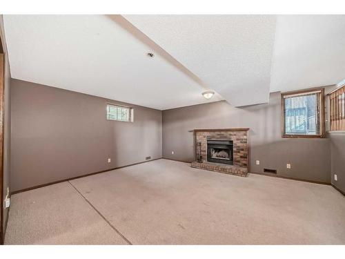 308 Macewan Valley Road Nw, Calgary, AB - Indoor With Fireplace