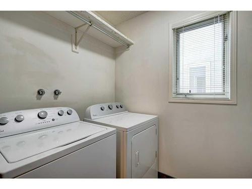 101 Mckinley Road Se, Calgary, AB - Indoor Photo Showing Laundry Room