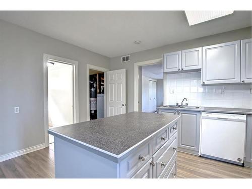 2003 62 Avenue Se, Calgary, AB - Indoor Photo Showing Kitchen With Double Sink