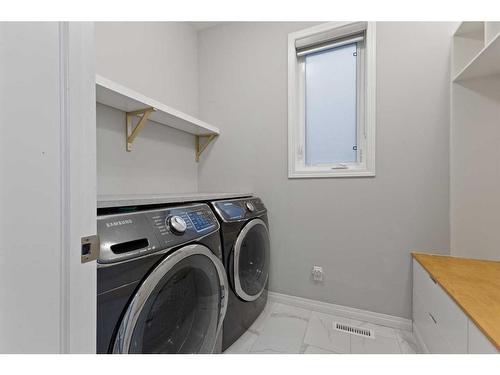 235 Cityside Road Ne, Calgary, AB - Indoor Photo Showing Laundry Room