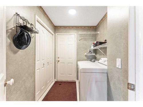 234 Mountain Park Drive Se, Calgary, AB - Indoor Photo Showing Laundry Room