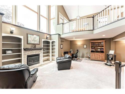 234 Mountain Park Drive Se, Calgary, AB - Indoor Photo Showing Other Room With Fireplace