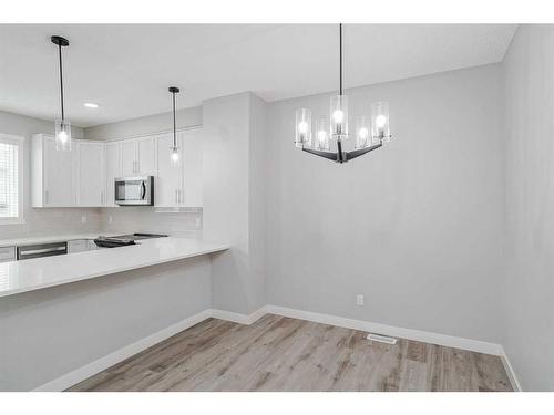 136 Savanna Passage Ne, Calgary, AB - Indoor Photo Showing Kitchen With Upgraded Kitchen