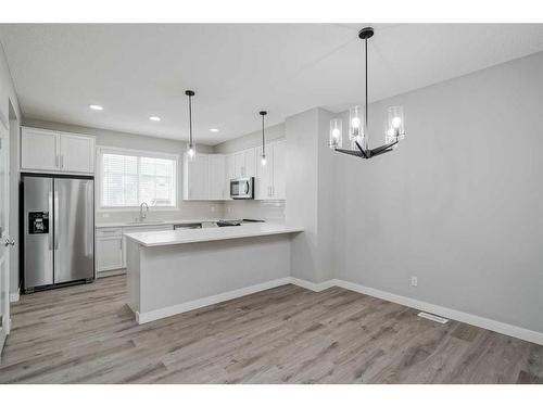 136 Savanna Passage Ne, Calgary, AB - Indoor Photo Showing Kitchen