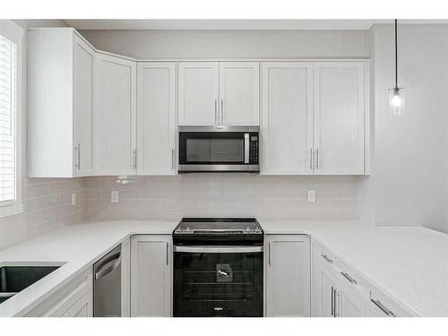 136 Savanna Passage Ne, Calgary, AB - Indoor Photo Showing Kitchen