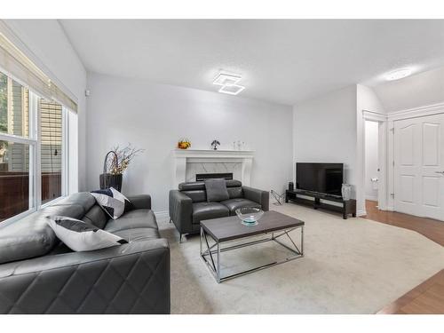 261 Bridleridge View Sw, Calgary, AB - Indoor Photo Showing Living Room