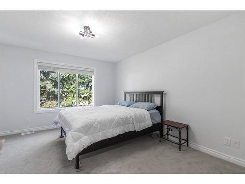 261 Bridleridge View Sw, Calgary, AB - Indoor Photo Showing Bedroom